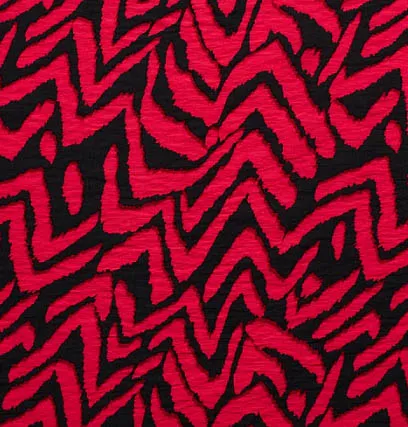 Viscosemengeling zwart met roodkleurige abstract patroon